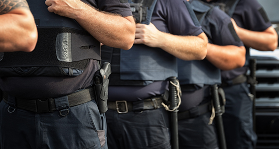 Soldiers security in the ranks, ammunition equipment and weapons, with a shallow depth of field
